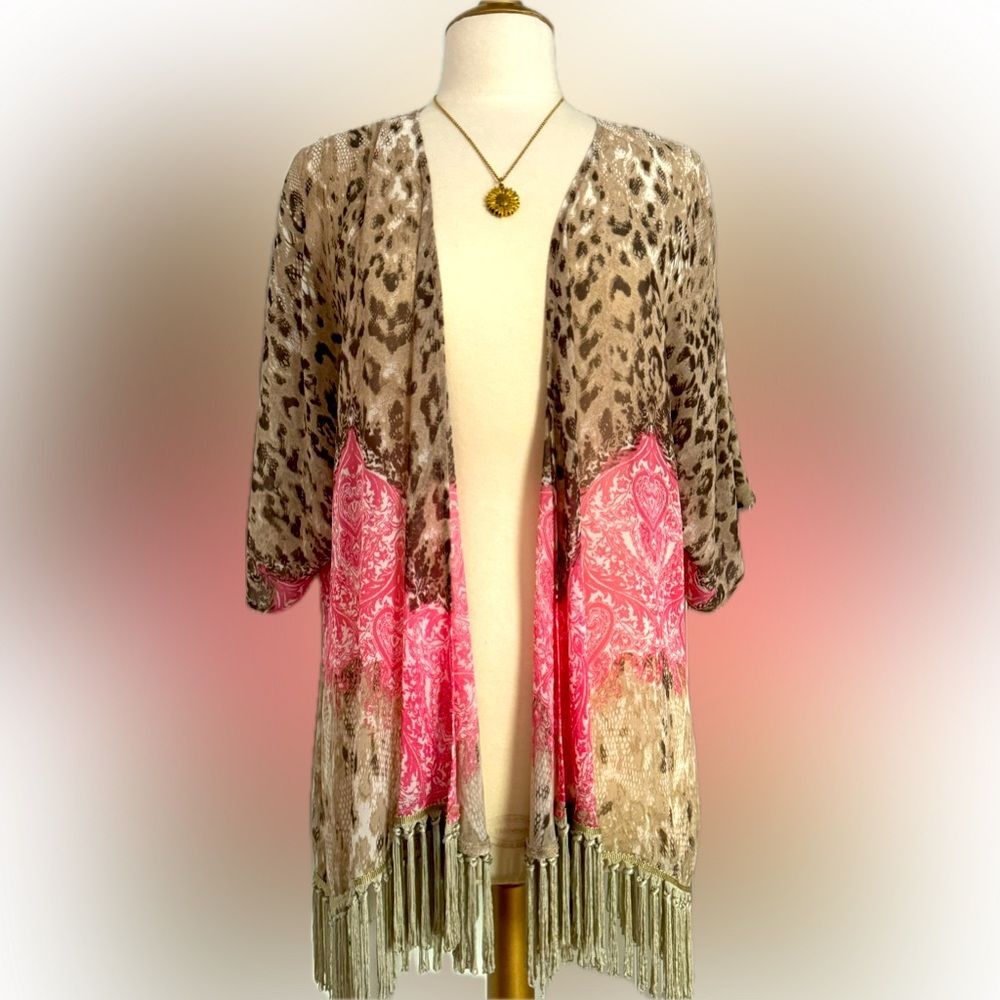 Like new! Beautiful flowy top with tassels. Read description!!
